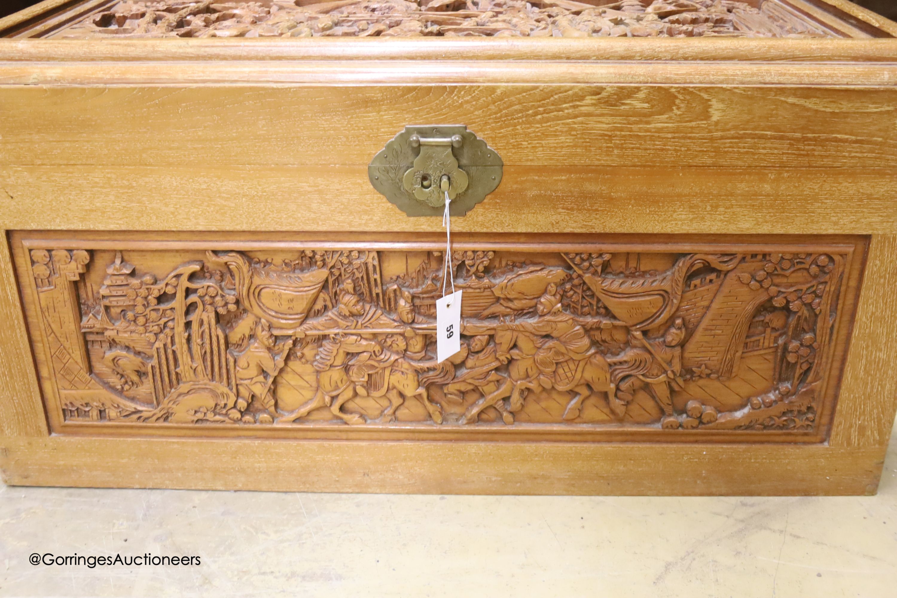 A Chinese carved camphorwood chest, length 100cm, depth 50cm, height 50cm